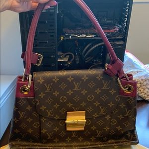Louis Vuitton Olympe